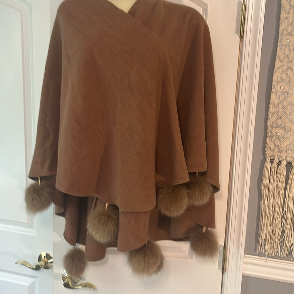 Wool and cashmere cape with fur trim pom poms. One size